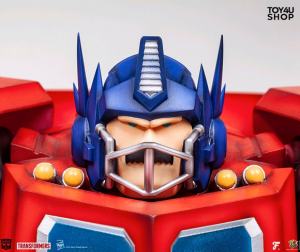 Transformers News: New $400 Statue of Optimus Prime as a Football Player Released