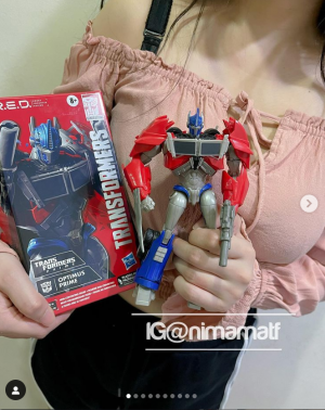 Transformers News: In Hand Images of RED Prime Optimus Prime