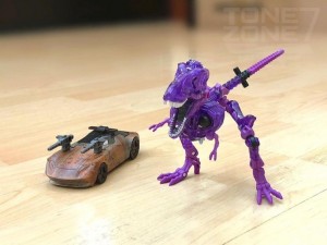 Transformers News: More Images of Netflix Barricade and Paleotrex redecos