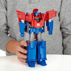 Transformers News: Transformers Robots in Disguise (2015) Hyper Change Optimus Prime Stock Photos