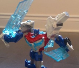 Transformers News: In Hand Pictures of Toysrus Exclusive Redeco of Transformers RID Power Surge Optimus Prime Warrior Figure With Retool Comparison and Review