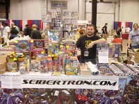 Transformers News: BotCon table #59 "Reserved for Late Dealer" ... Seibertron.com!