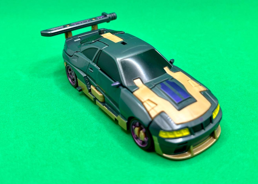 Transformers News: New Images of Rise of the Beasts Deluxe Nightbird Shows how the Weapons form the Spoiler in Alt Mode