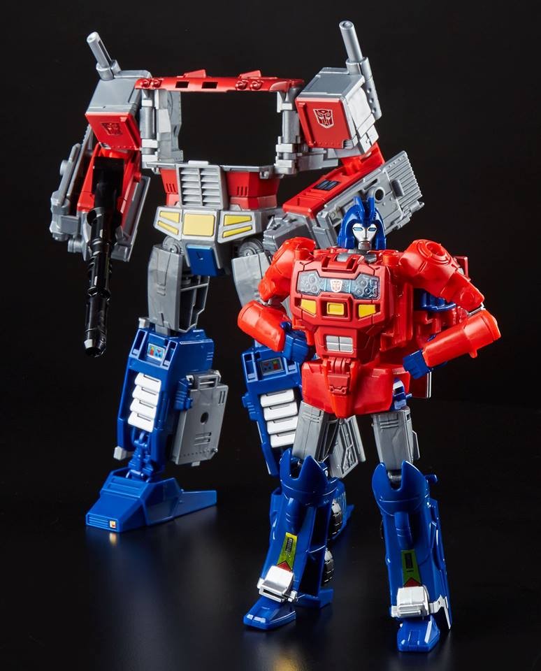 Transformers News: In-Hand Images of Transformers Power of the Primes Leader Rodimus and Optimus Prime Mid-Evolution
