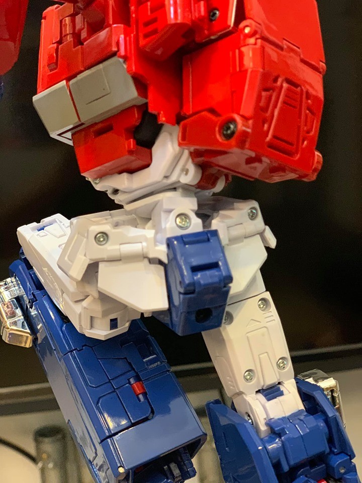 Transformers News: Transformers MP44 Optimus Prime In Hand Images Showing Accessories, Articulation, Collector Pin